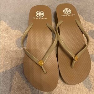 Like new Tory Burch rubber flip flops.